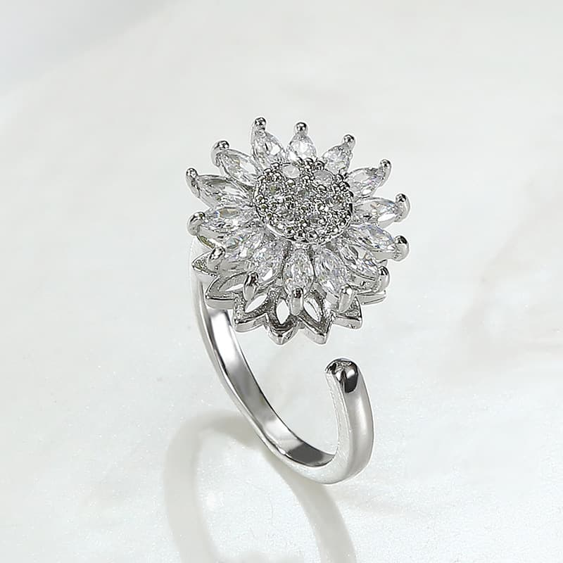ANILLO GIRASOL PLATEADO GIRA+ caja