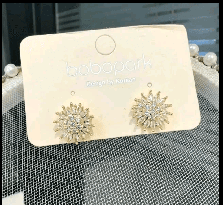 ARETES DE GIRASOL GIRATORIO DORADO + caj