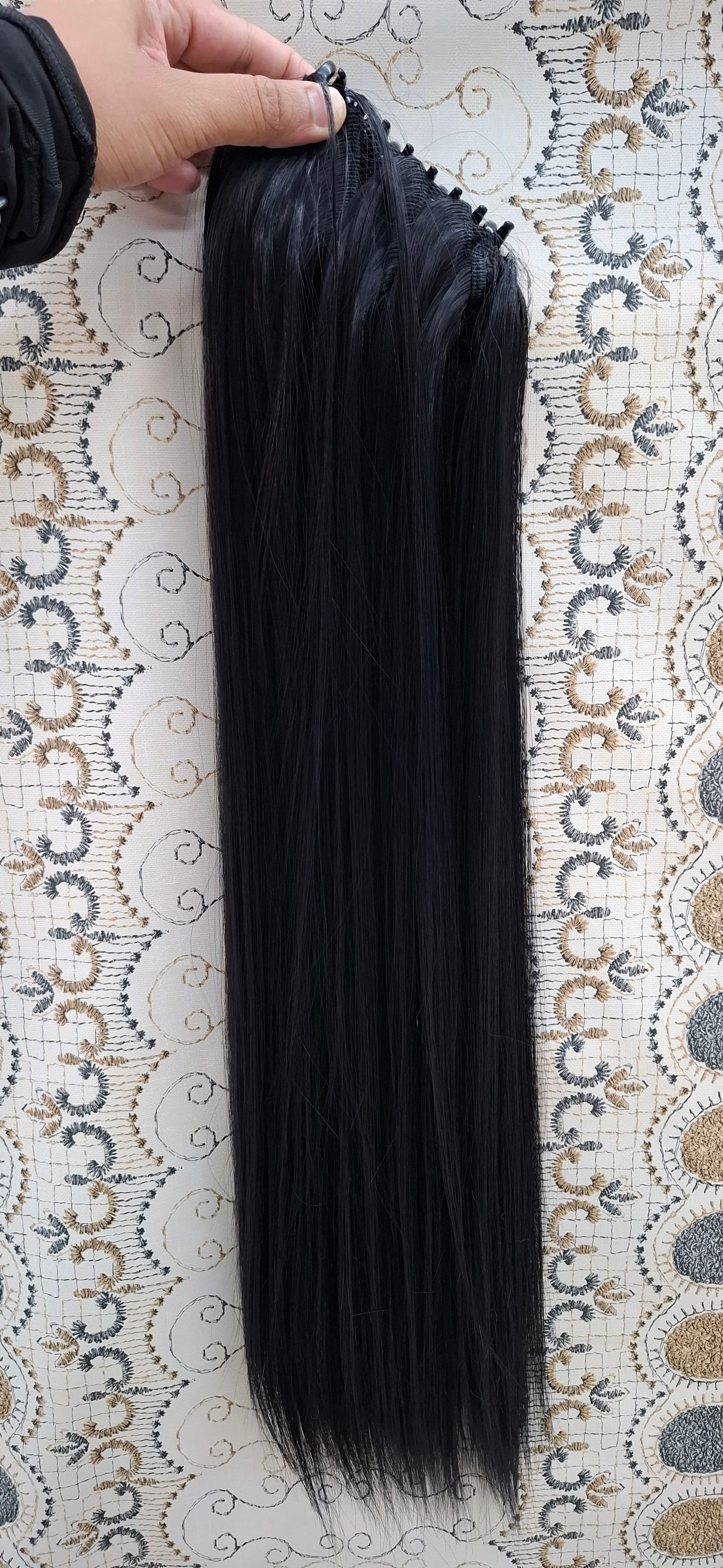 Coleta de cabello seminatural con caiman