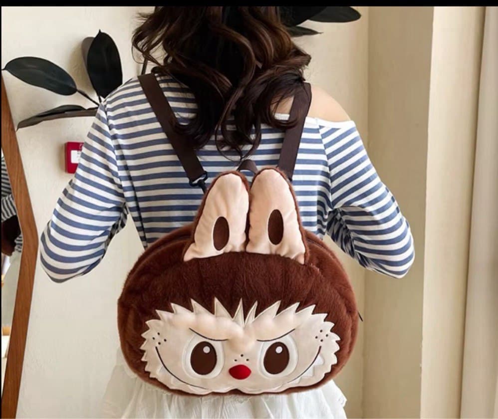 bolso peluche cara de labubu